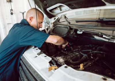 Lorentz Automotive Scott working on engine Gallery
