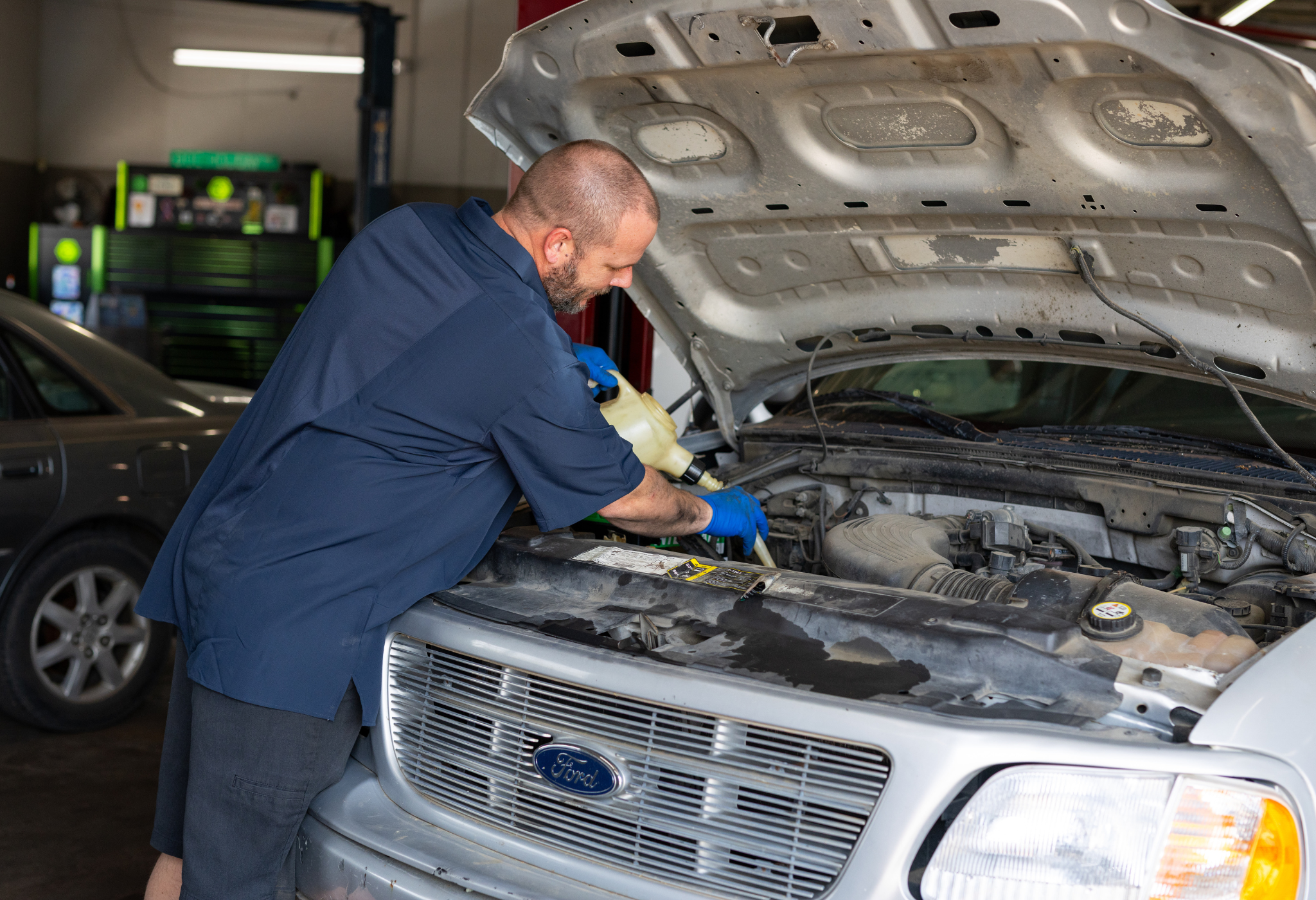 The technician was inspecting the car’s brake pads when he noticed that they were severely worn. He determined that the brake pads had to be replaced immediately.