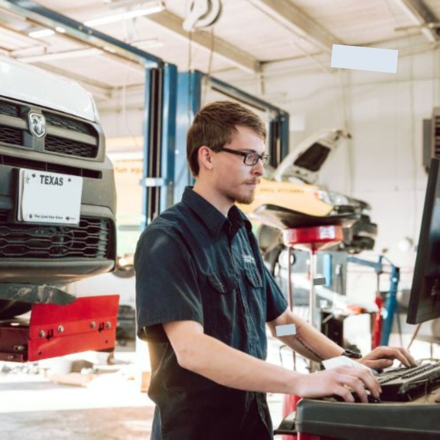 Lorentz Automotive garage working on cars Mechanics and Team